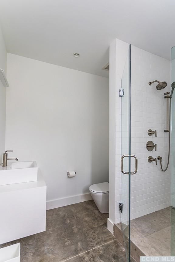 708 New Forge Rd II Taghkanic, NY 12502 - Photo 25 of 29 a bathroom with a toilet and shower