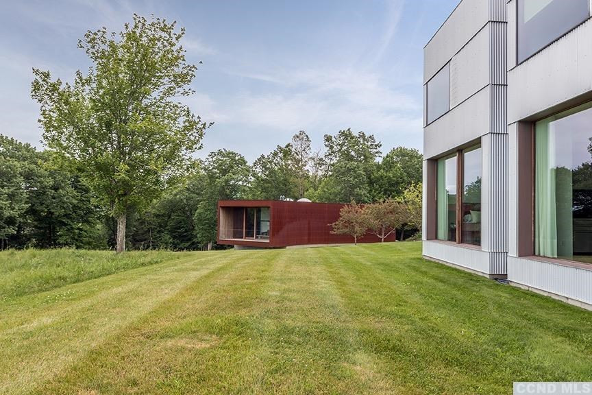 708 New Forge Rd II Taghkanic, NY 12502 - Photo 4 of 29 a view of an house with backyard and trees