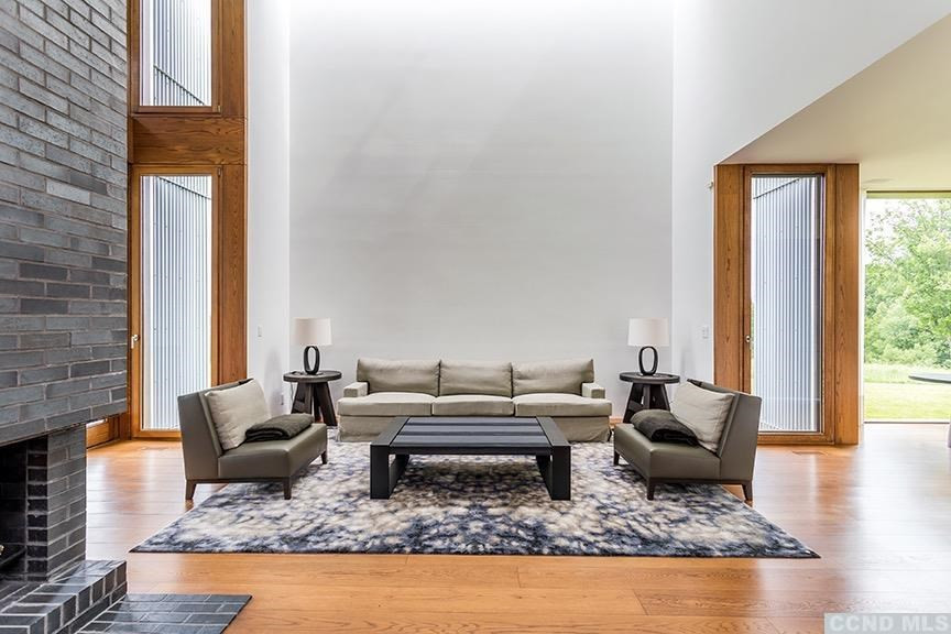 708 New Forge Rd II Taghkanic, NY 12502 - Photo 8 of 29 a living room with furniture and a rug