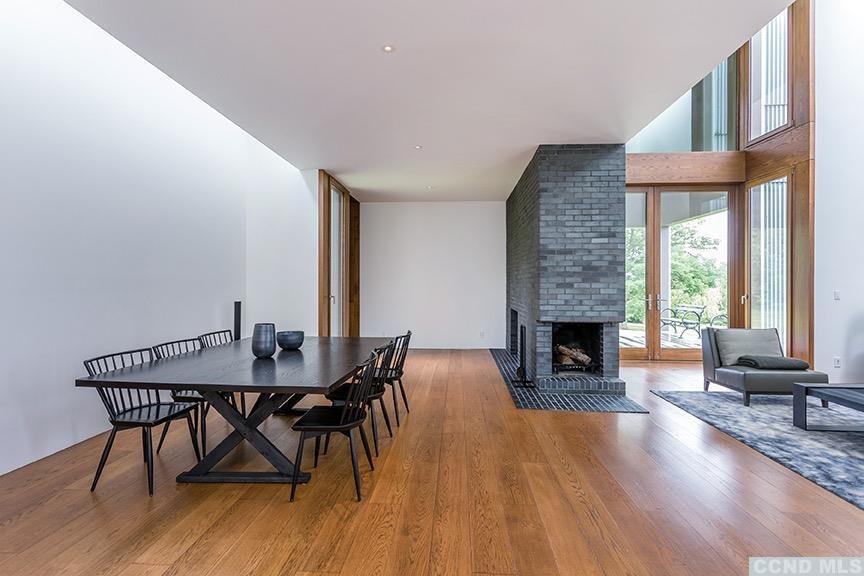 708 New Forge Rd II Taghkanic, NY 12502 - Photo 10 of 29 a view of a dining room with furniture window and wooden floor