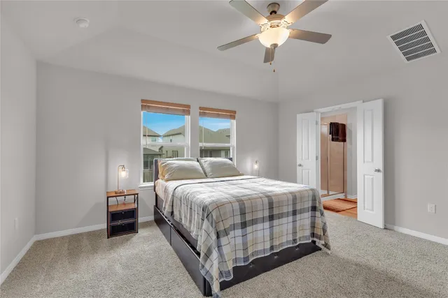 a living room with furniture a couch and dresser
