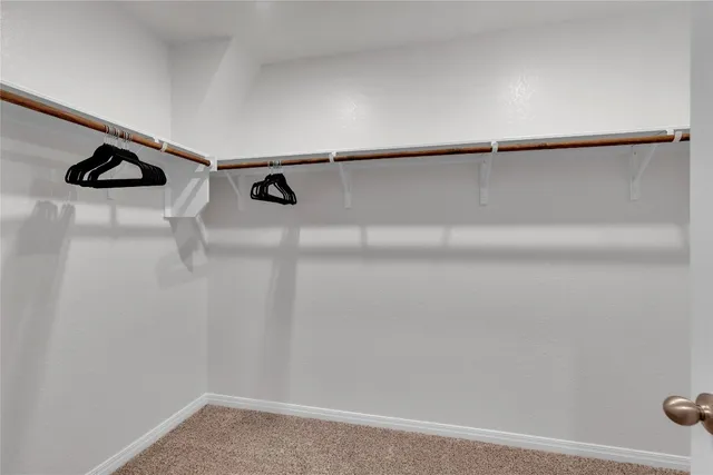 a en suite bathroom with a sink and a mirror