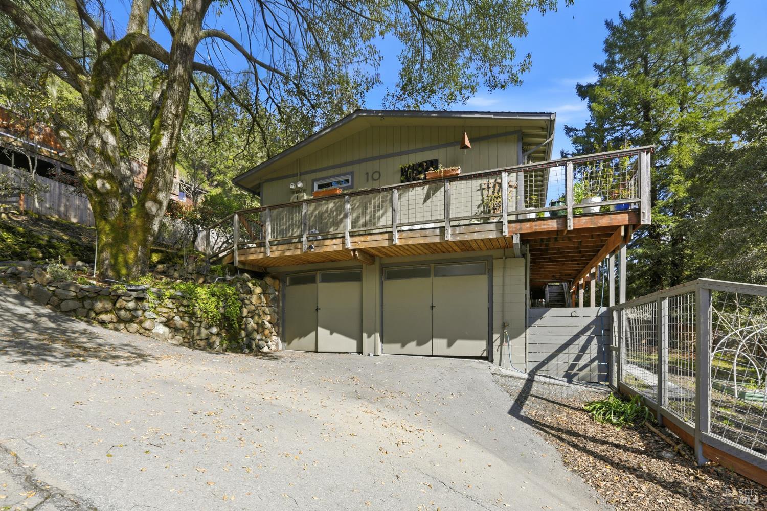 10 Pedrini Way Lagunitas, CA 94938 - Photo 1 of 31 a front view of a house with parking