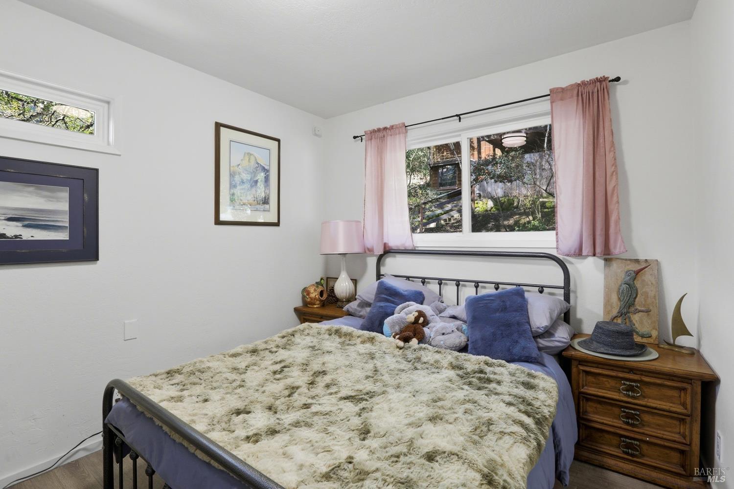 10 Pedrini Way Lagunitas, CA 94938 - Photo 15 of 31 a bed sitting in a bedroom next to a window