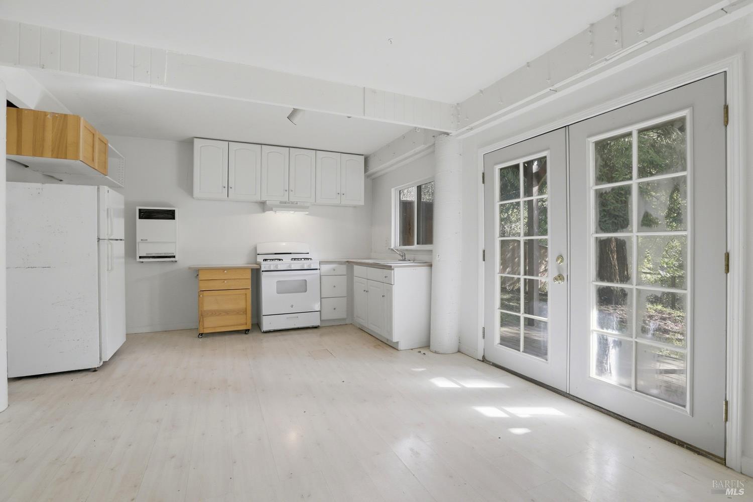 10 Pedrini Way Lagunitas, CA 94938 - Photo 23 of 31 a view of a kitchen with white cabinets and refrigerator