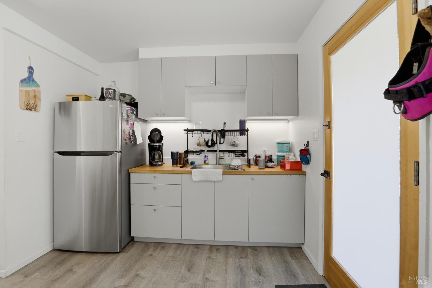10 Pedrini Way Lagunitas, CA 94938 - Photo 6 of 31 a kitchen with a refrigerator and a sink
