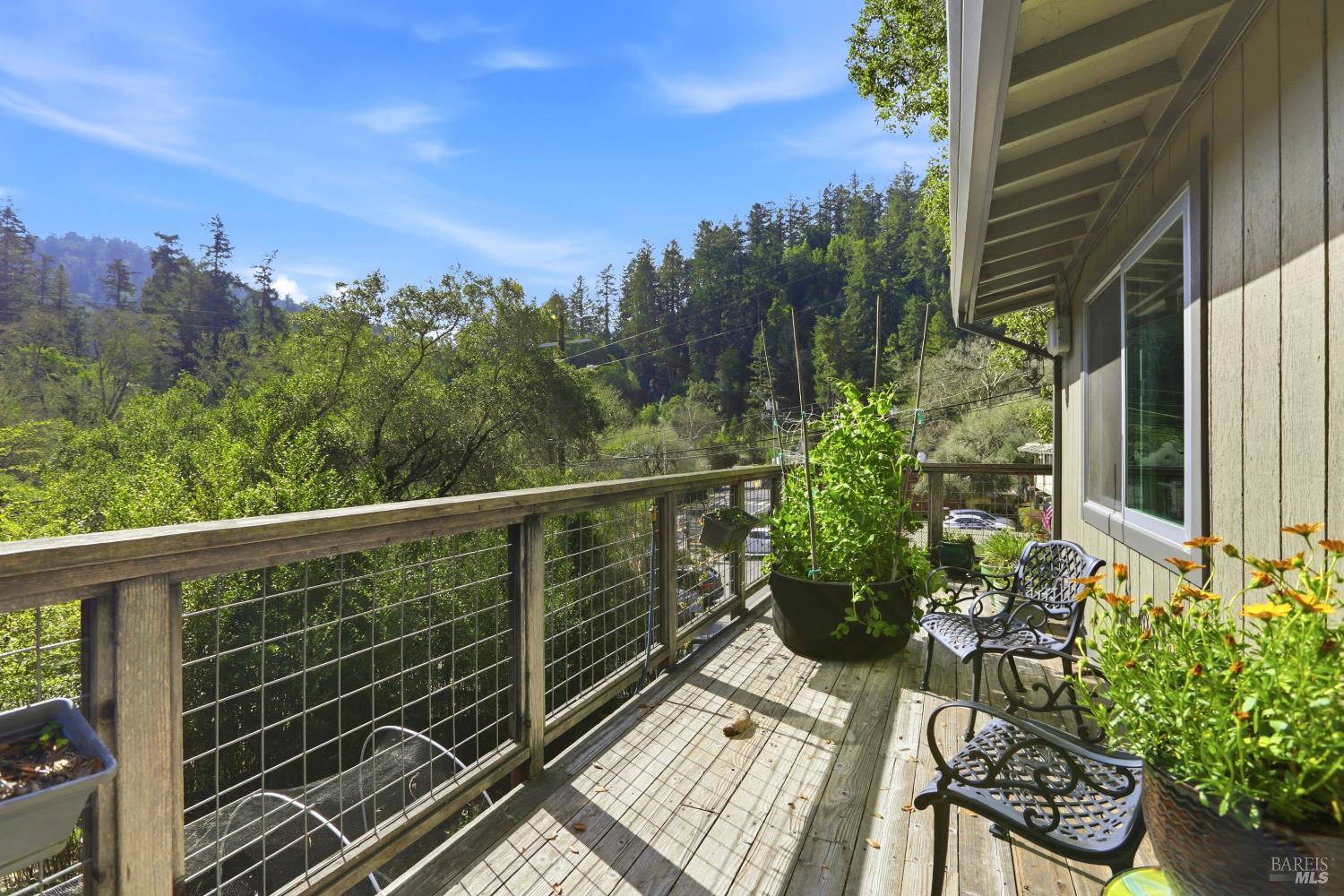 10 Pedrini Way Lagunitas, CA 94938 - Photo 10 of 31 a view of balcony with wooden floor and potted plants