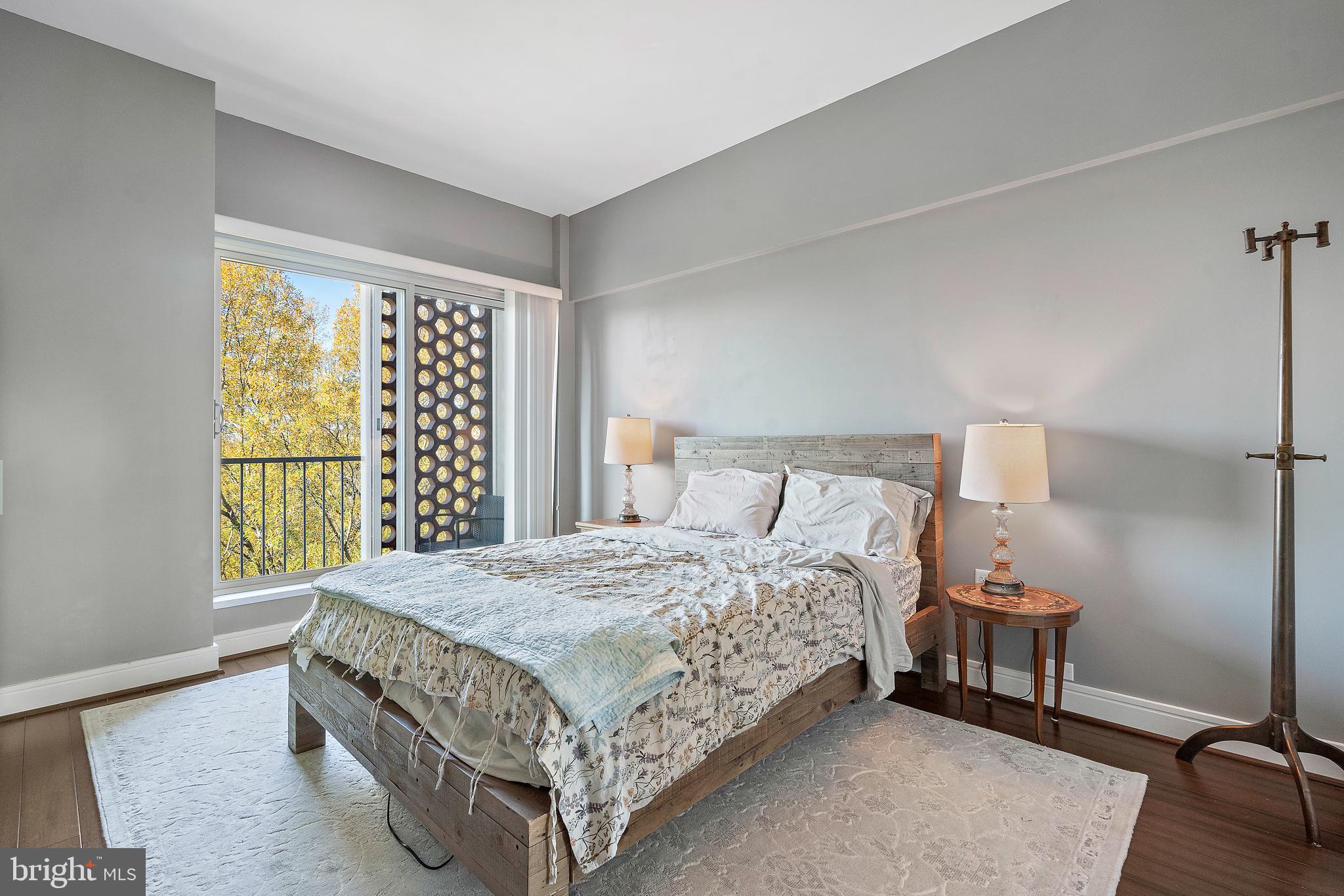 800 4th Street Southwest, Unit N801 Washington, DC 20024 - Photo 11 of 31 a bedroom with a bed and a window