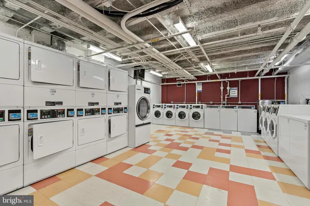 a building with cars parked in front of it