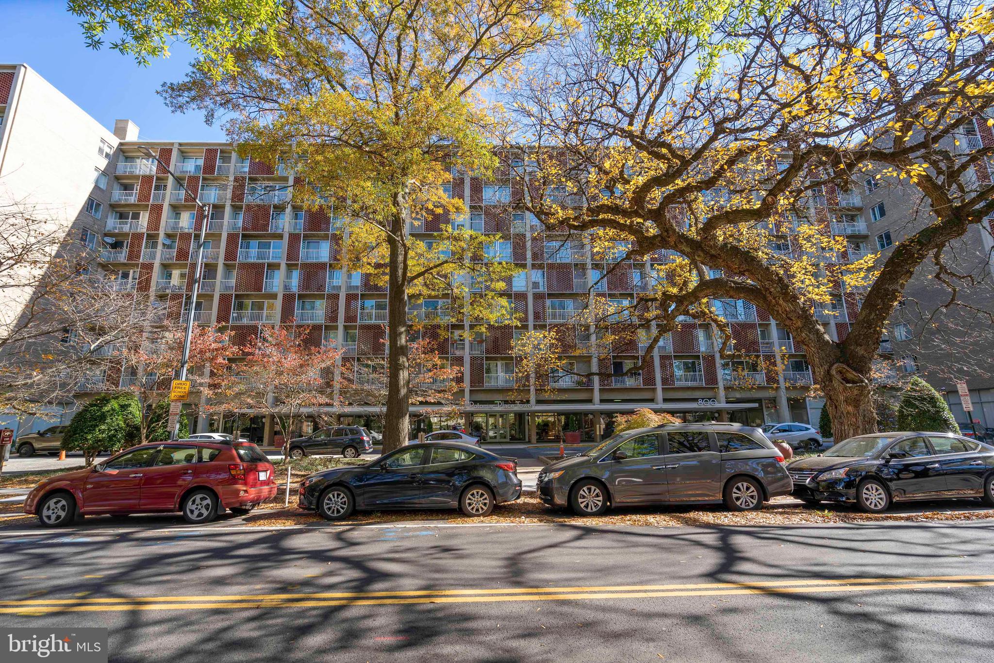 800 4th Street Southwest, Unit N801 Washington, DC 20024 - Photo 29 of 31 a building with cars parked in front of it