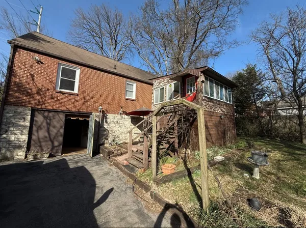 a front view of a house with yard