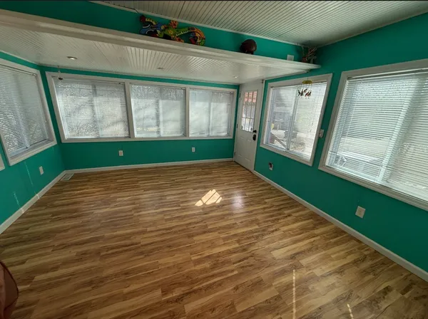 a view of empty room with a window