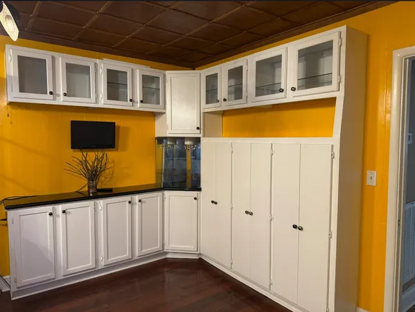 a view of a house with a wooden door