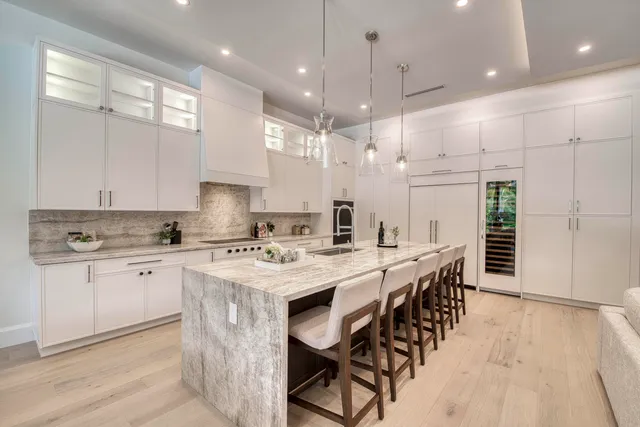 a large kitchen with lots of counter space and appliances