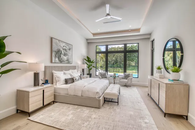 a bathroom with a tub shower and sink