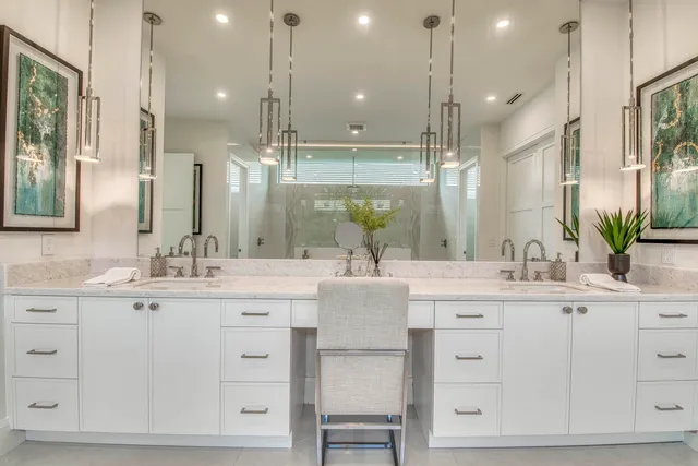 an empty room with a window and a ceiling fan