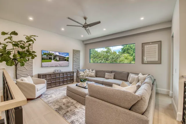 a bathroom with a double vanity sink mirror and shower