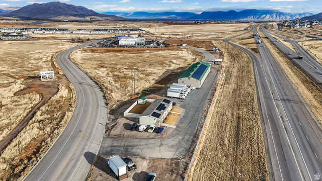 15371 Frontage Road Santaquin, UT 84655 - Photo 18 of 18 Aerial overview of property's location with a mountain backdrop