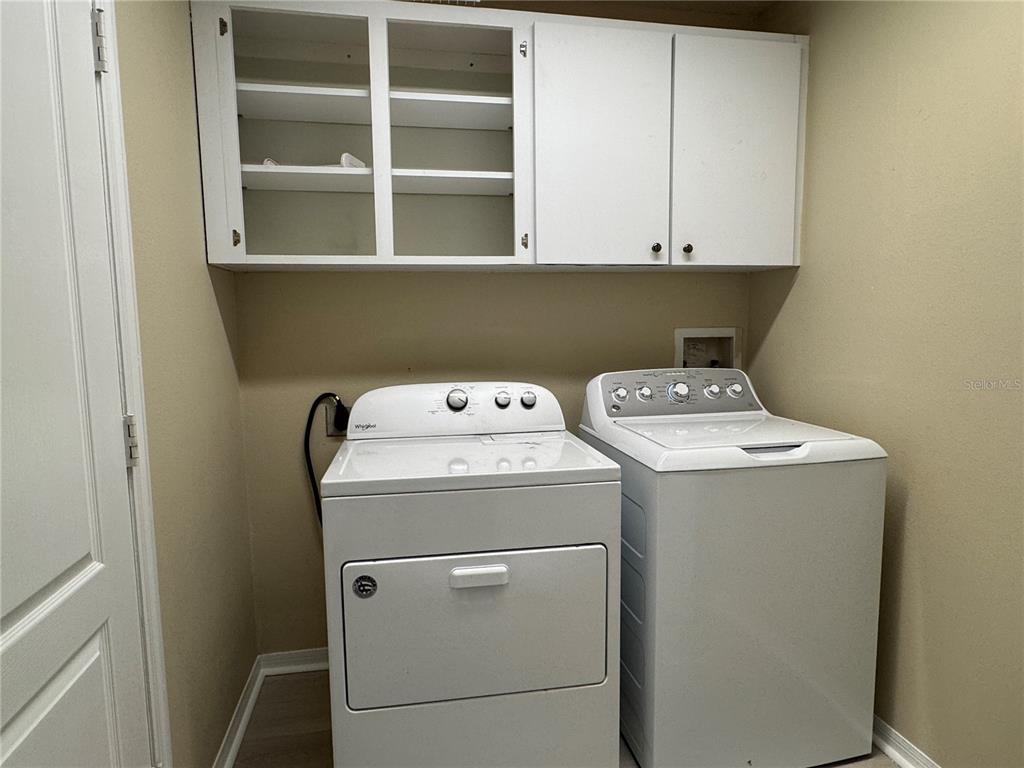 1414 Trail Boss Lane Brandon, FL 33511 - Photo 34 of 37 a utility room with dryer and washer