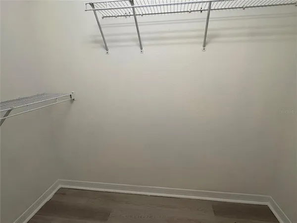 a view of small space with racks on the wall