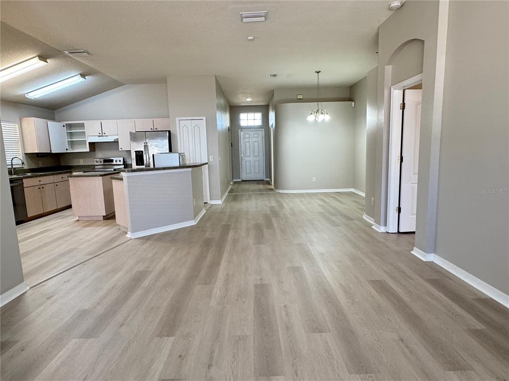 1414 Trail Boss Lane Brandon, FL 33511 - Photo 5 of 37 a view of kitchen with sink microwave and refrigerator