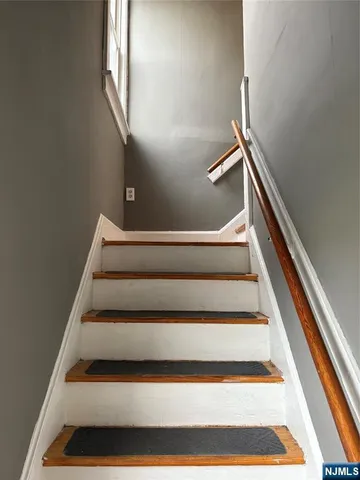 a view of a big room with wooden floor