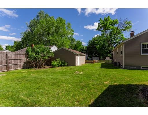 501 Granby Road Chicopee, MA 01013 - Photo 21 of 26 a backyard of a house with lots of green space