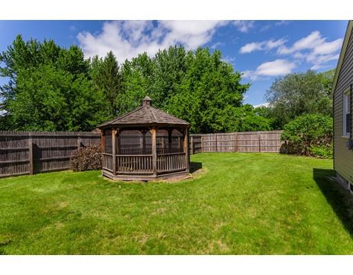 501 Granby Road Chicopee, MA 01013 - Photo 5 of 26 a view of an house with backyard and a garden