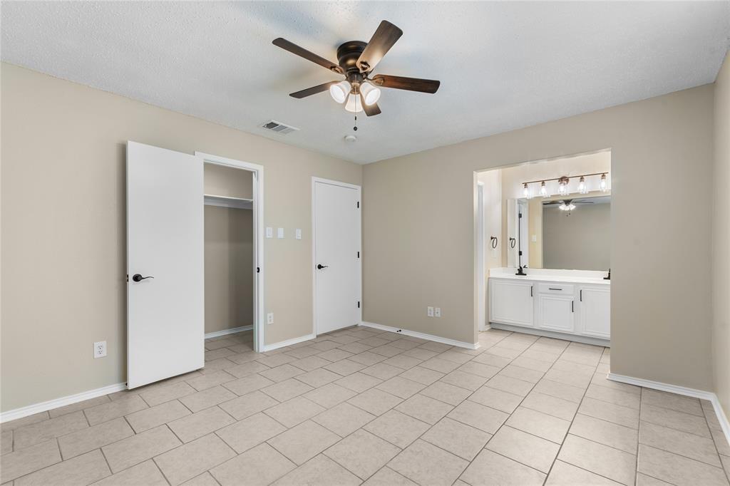 1035 North Ravinia Drive Dallas, TX 75211 - Photo 12 of 20 a view of work space with a sink and a mirror