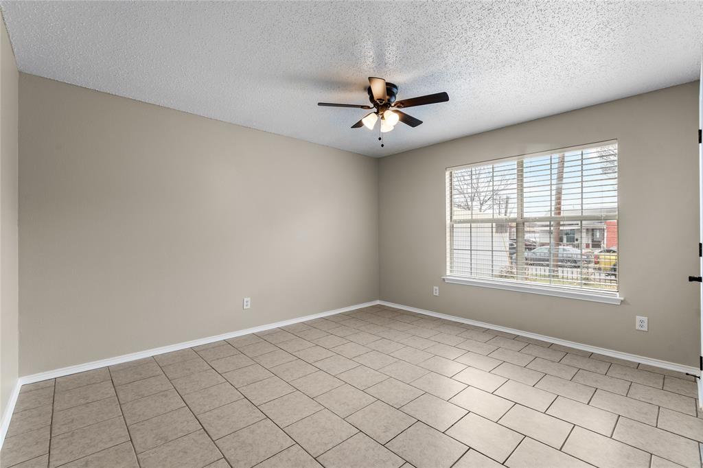 1035 North Ravinia Drive Dallas, TX 75211 - Photo 16 of 20 a view of empty room with window