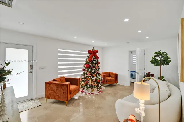 a room with lots of potted plants