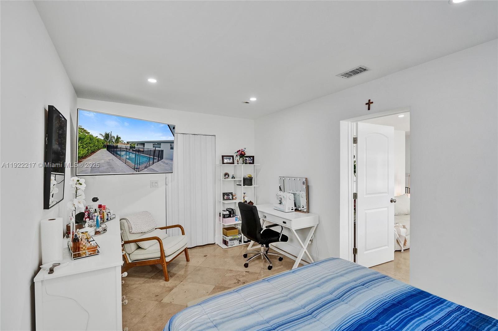 10401 Southwest 53rd Street Miami, FL 33165 - Photo 30 of 50 a view of a workspace with furniture and wooden floor