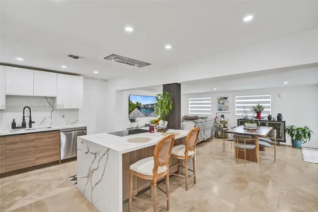 a view of a dining room kitchen and a sink
