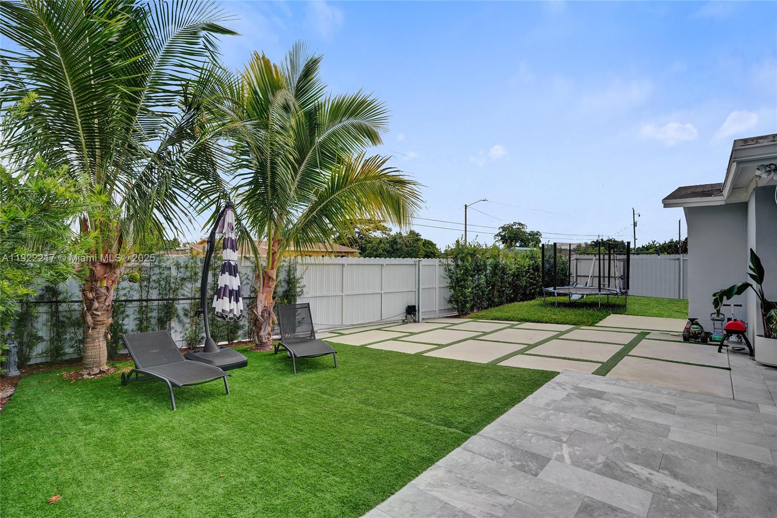 10401 Southwest 53rd Street Miami, FL 33165 - Photo 43 of 50 a view of a backyard with a garden and plants