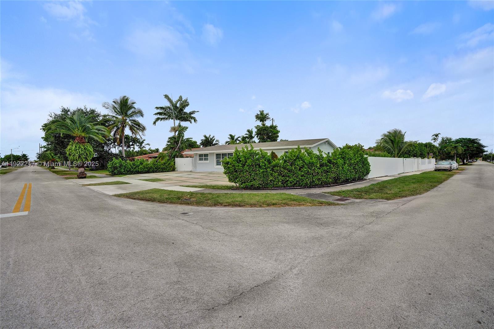 10401 Southwest 53rd Street Miami, FL 33165 - Photo 5 of 50 a view of a road with a garden