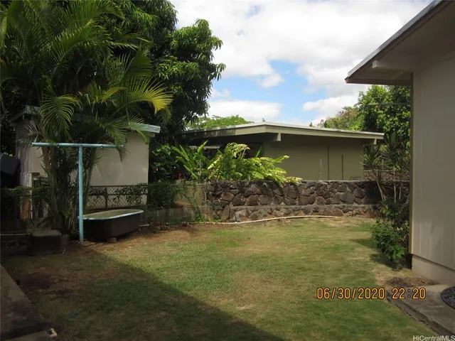 a view of livingroom with furniture wooden floor and window