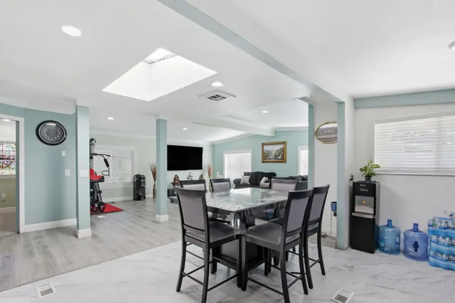 a view of a dining room with furniture