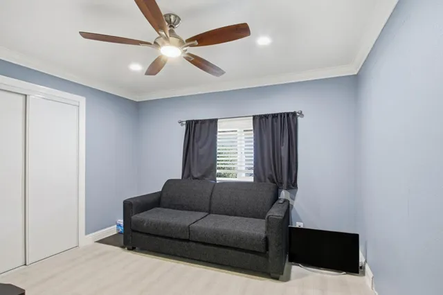 a living room with furniture and a window