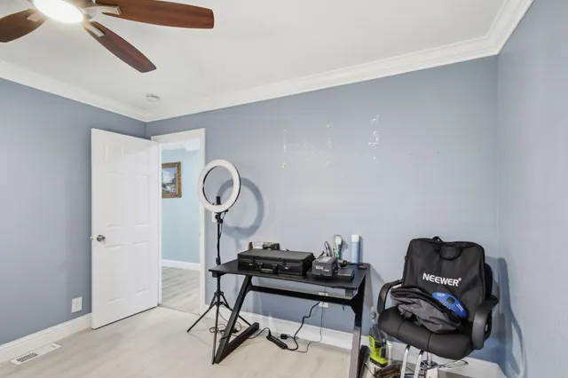 a view of a workspace with furniture