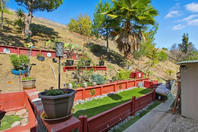 a view of an outdoor space and tennis court