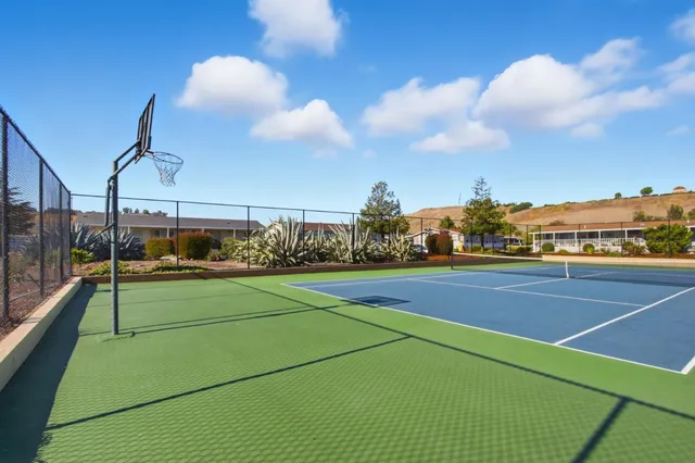 a front view of a house with a yard and porch
