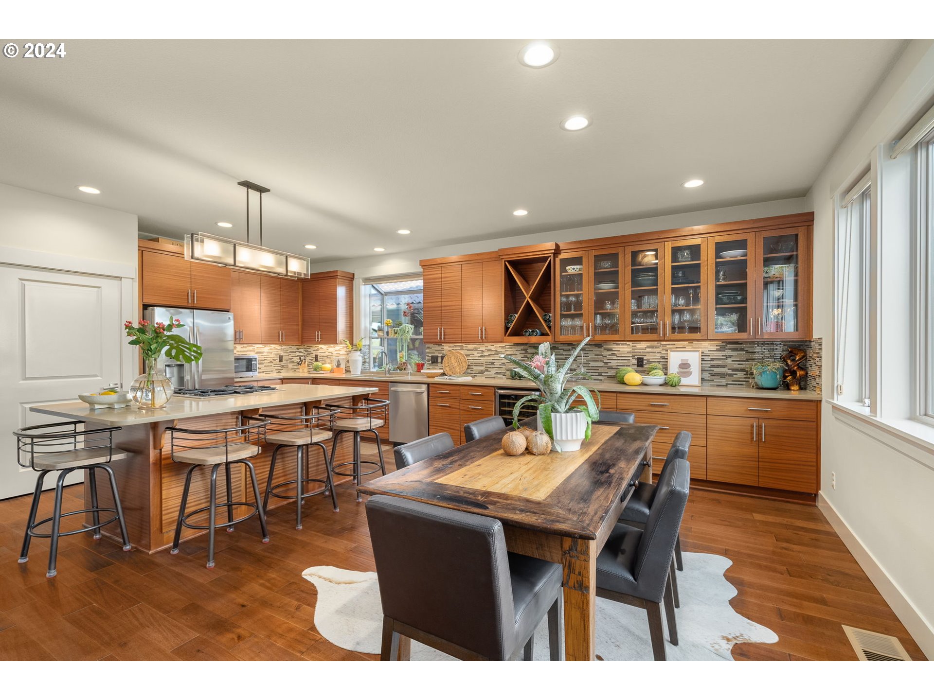 1011 Columbia Ridge Drive Vancouver, WA 98664 - Photo 11 of 34 a dining hall with stainless steel appliances kitchen island a table and chairs