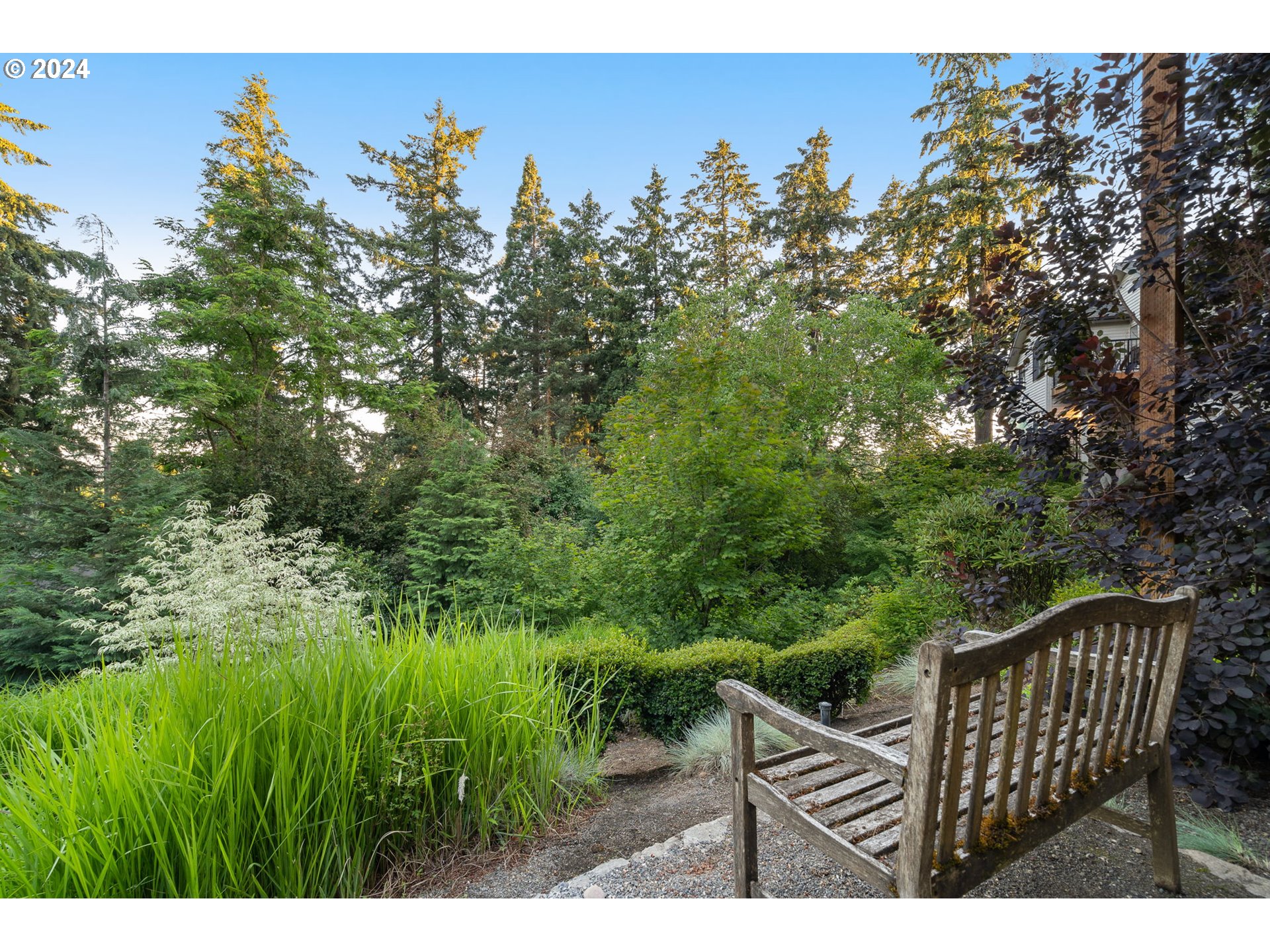 1011 Columbia Ridge Drive Vancouver, WA 98664 - Photo 25 of 34 a view of a wooden fence and trees in the background