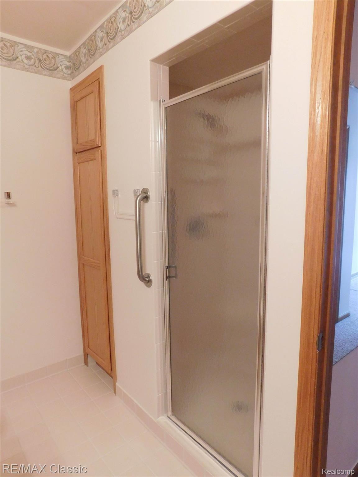 21840 River Ridge Trail, Unit 104 Farmington, MI 48335 - Photo 19 of 35 MASTER BATH SHOWER