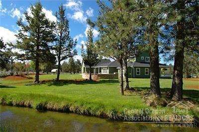 60670 Billadeau Road Bend, OR 97702 - Photo 7 of 25 a view of a house with a yard