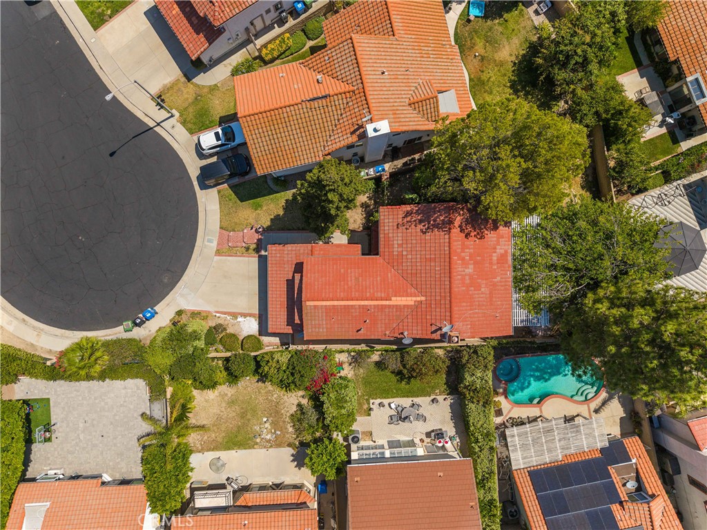 12065 Shadow Glen Lane Porter Ranch, CA 91326 - Photo 44 of 46 an aerial view of a house with a yard and a large tree