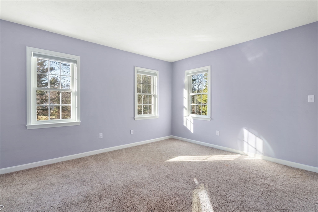 4 Plainview Road Wayland, MA 01778 - Photo 18 of 30 an empty room with windows