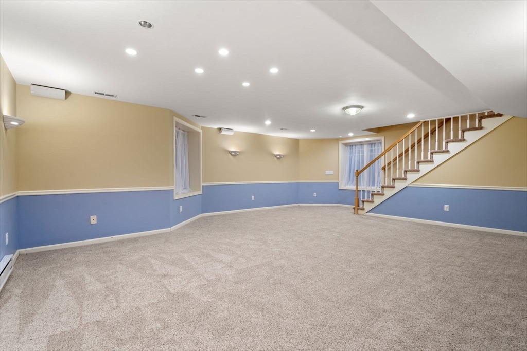 4 Plainview Road Wayland, MA 01778 - Photo 25 of 30 a view of an empty room with stairs and ventilation