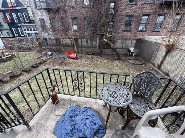 a view of balcony with furniture