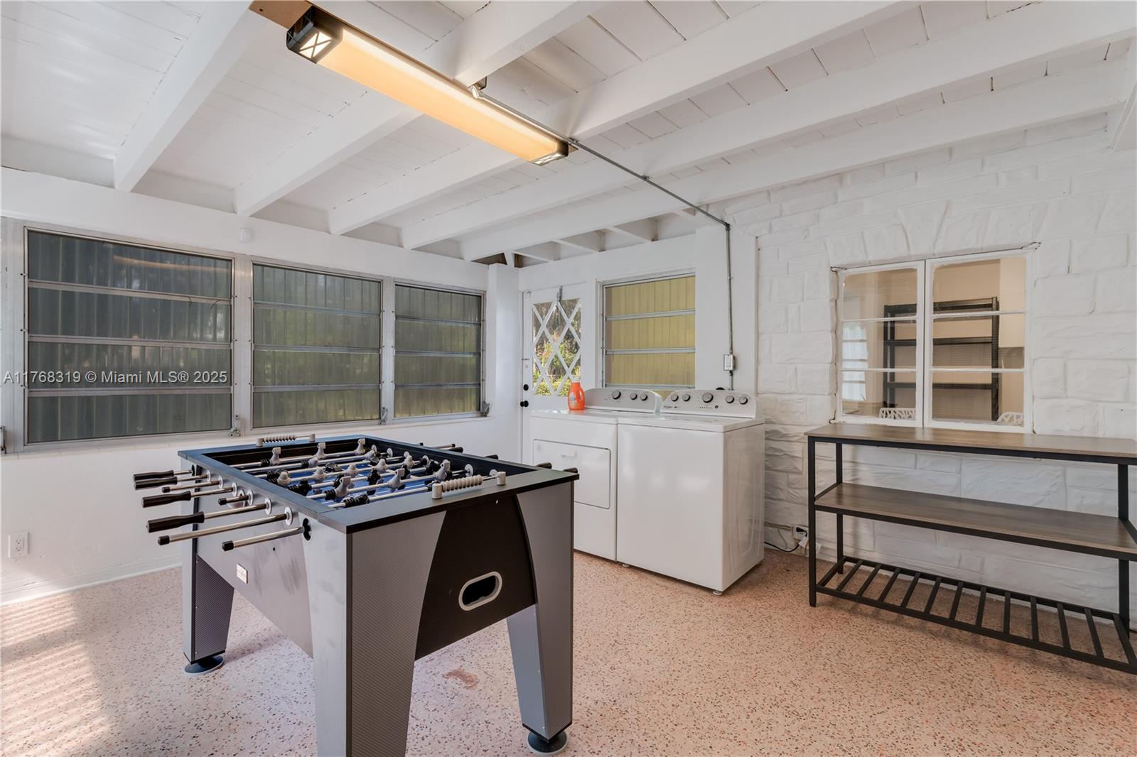 820 Southwest 26th Road Miami, FL 33129 - Photo 20 of 25 a kitchen that has a stove and a sink